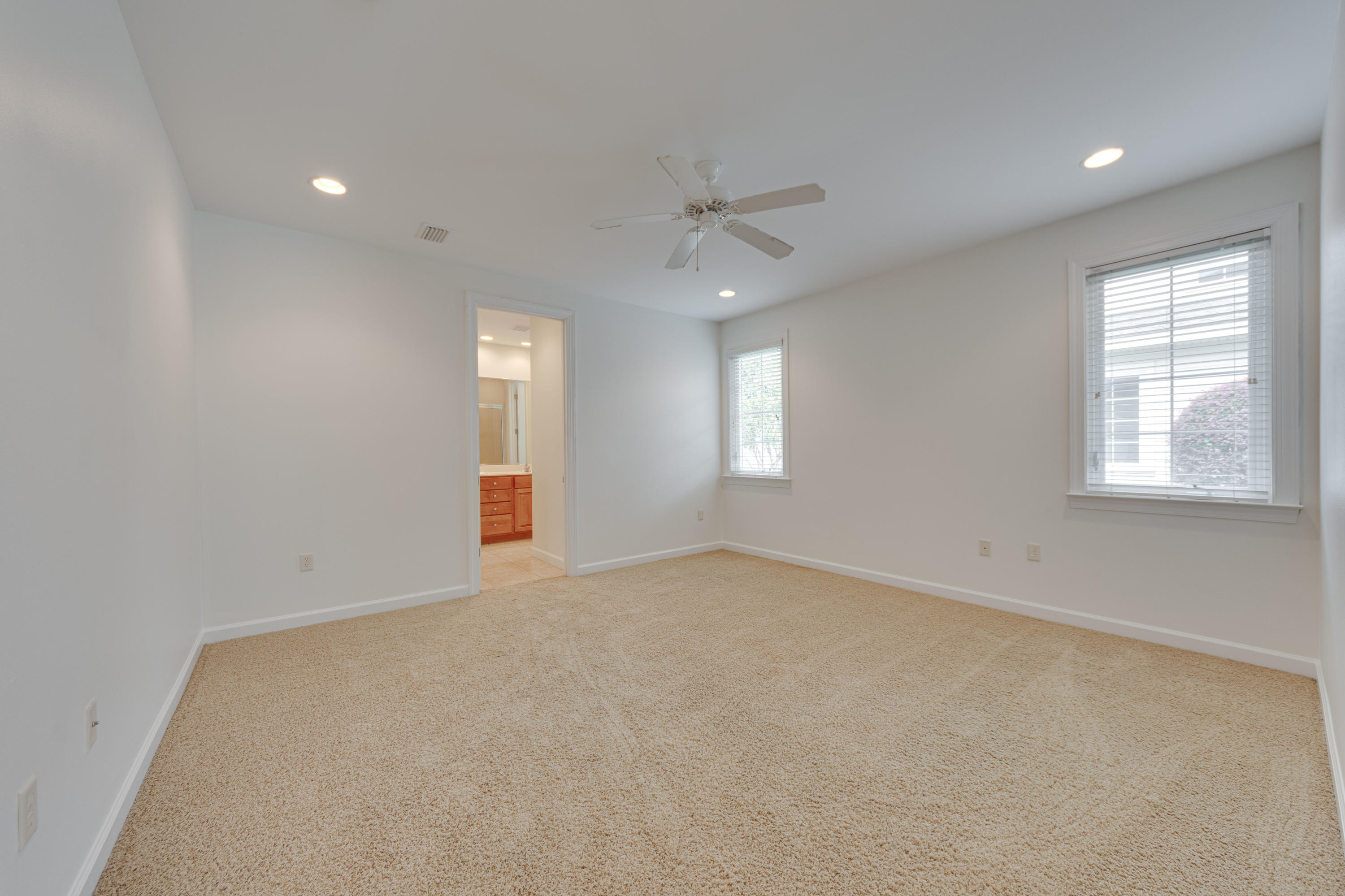 164 South Zander Way Santa Rosa Beach, FL 32459 - Photo 19 of 51 an empty room with windows and fan