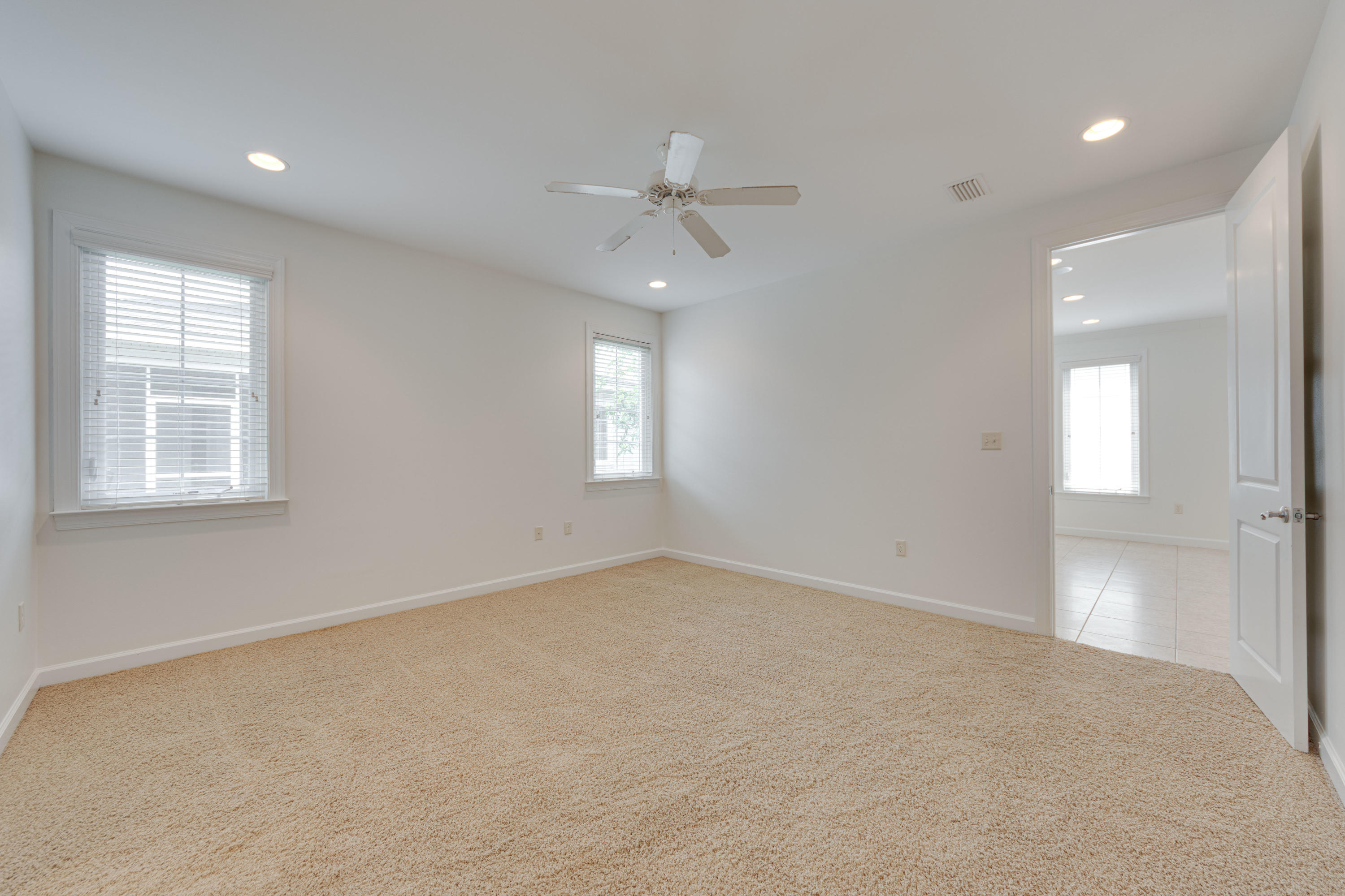 164 South Zander Way Santa Rosa Beach, FL 32459 - Photo 20 of 51 an empty room with windows and fan