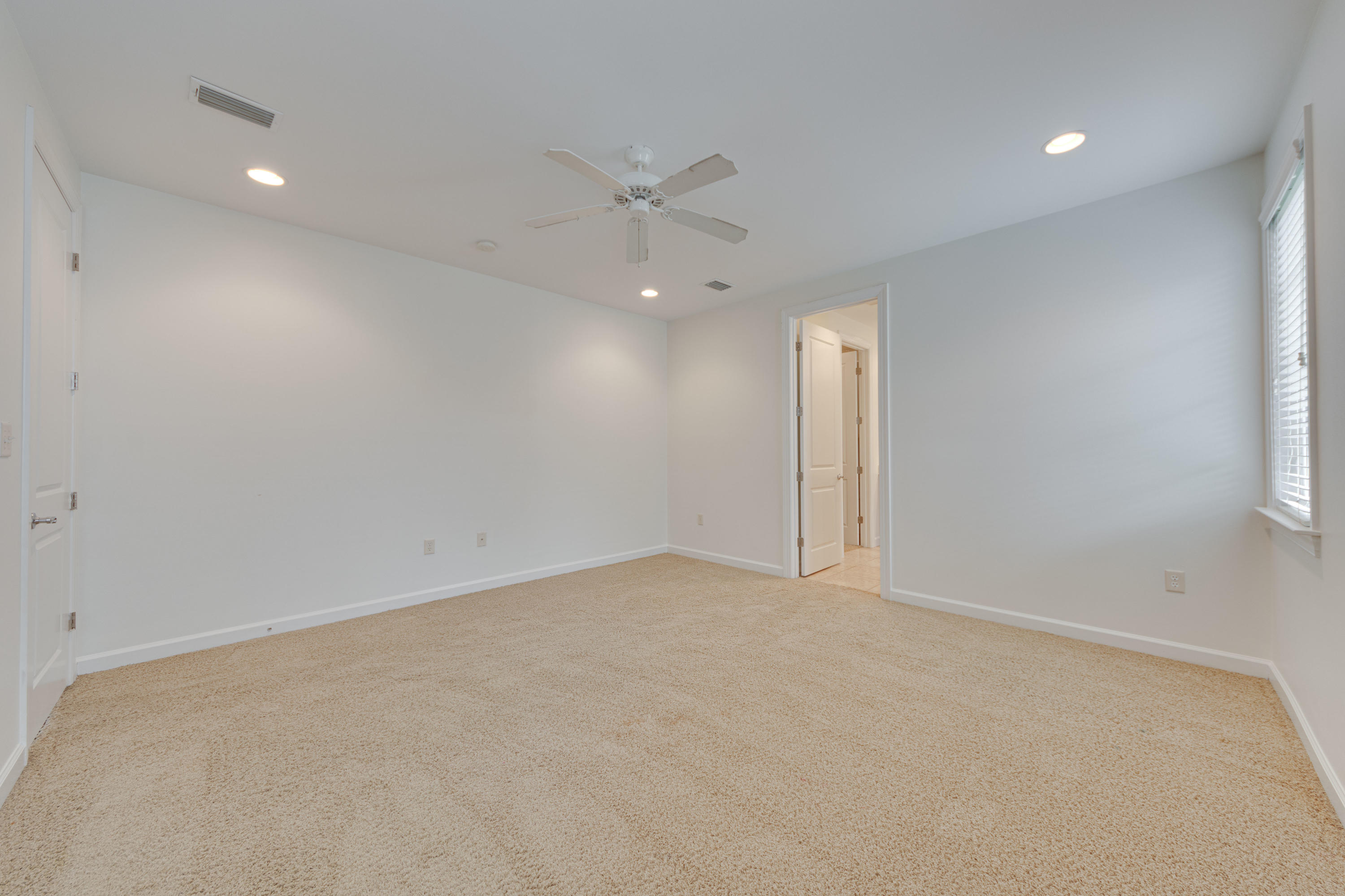 164 South Zander Way Santa Rosa Beach, FL 32459 - Photo 22 of 51 an empty room with a ceiling fan and window
