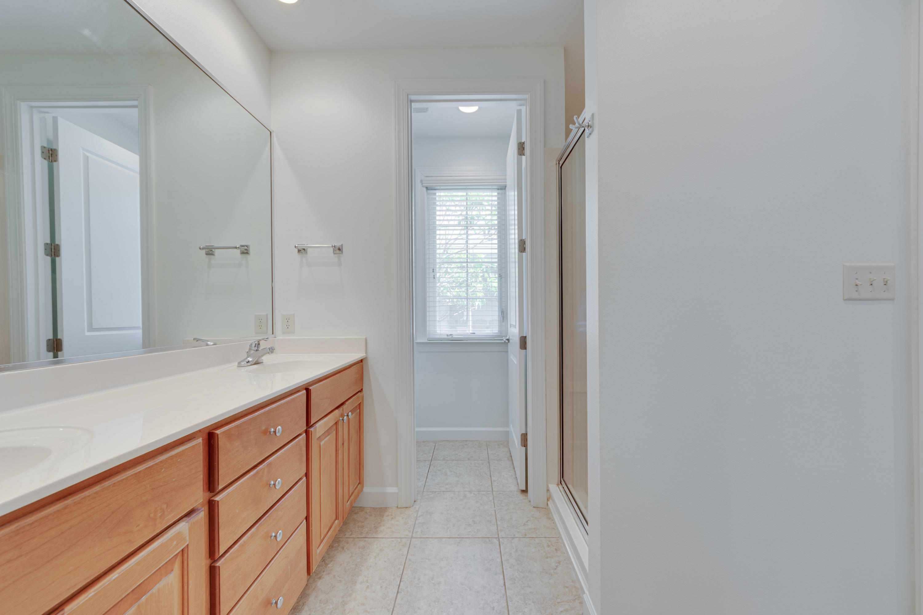 164 South Zander Way Santa Rosa Beach, FL 32459 - Photo 23 of 51 a bathroom with a sink and a mirror