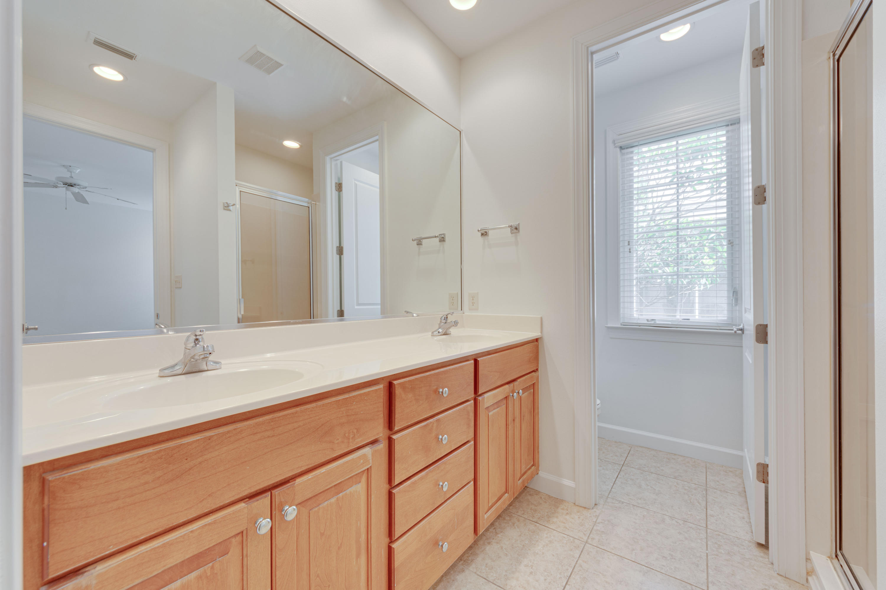 164 South Zander Way Santa Rosa Beach, FL 32459 - Photo 27 of 51 a bathroom with a sink and a mirror