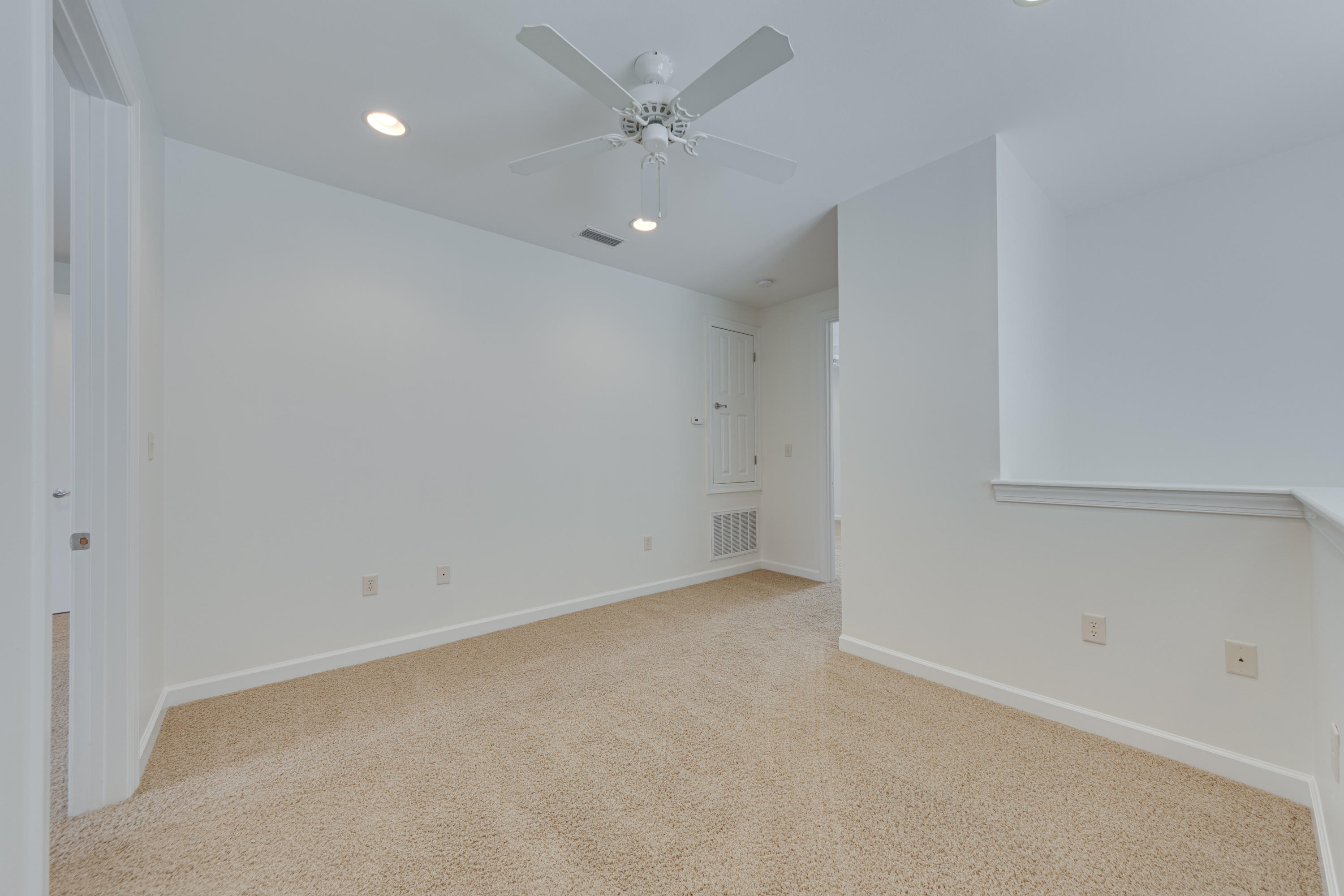 164 South Zander Way Santa Rosa Beach, FL 32459 - Photo 30 of 51 an empty room with a ceiling fan and a ceiling fan