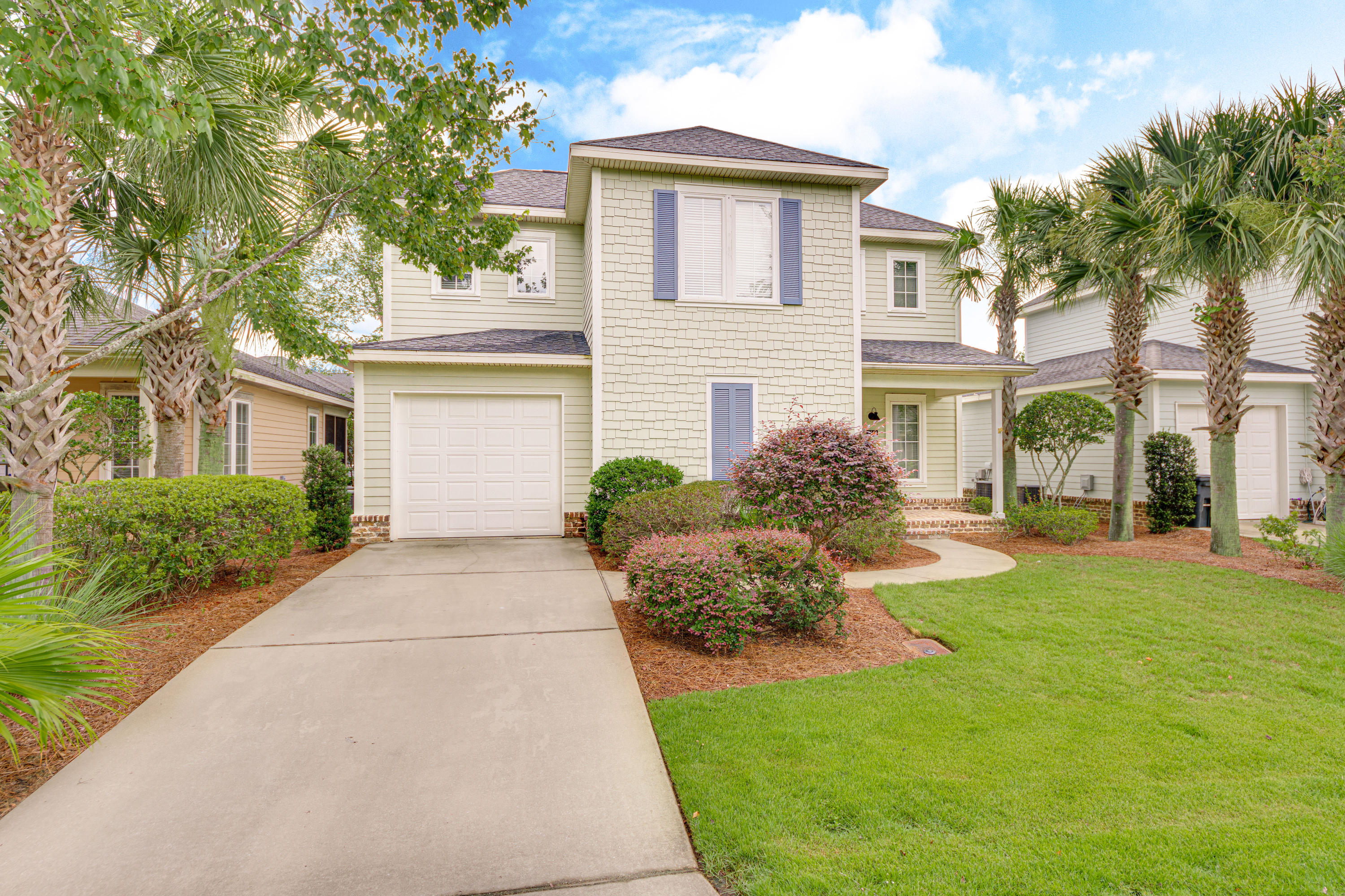 164 South Zander Way Santa Rosa Beach, FL 32459 - Photo 3 of 51 a front view of a house with a yard
