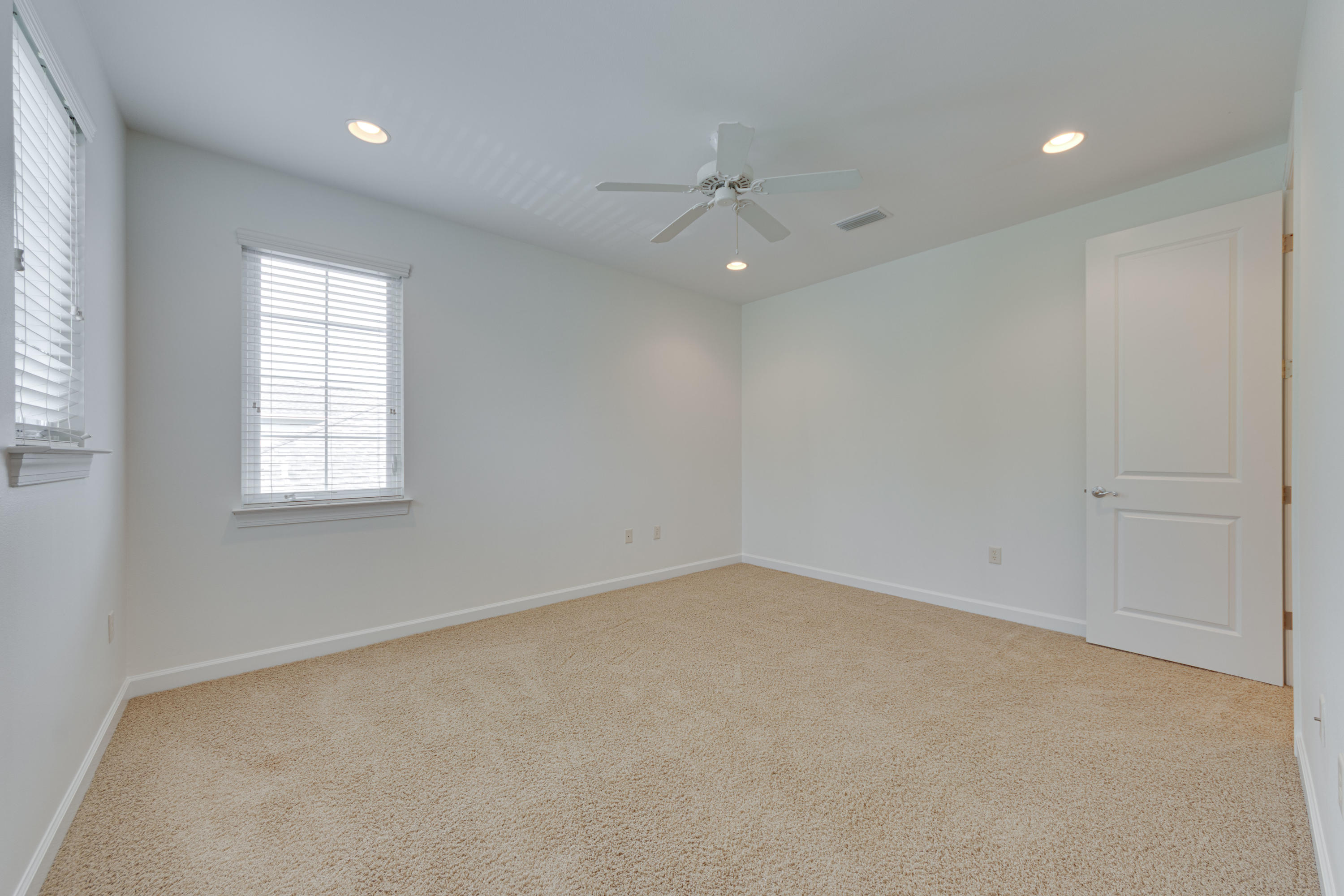 164 South Zander Way Santa Rosa Beach, FL 32459 - Photo 33 of 51 an empty room with a window and a ceiling fan