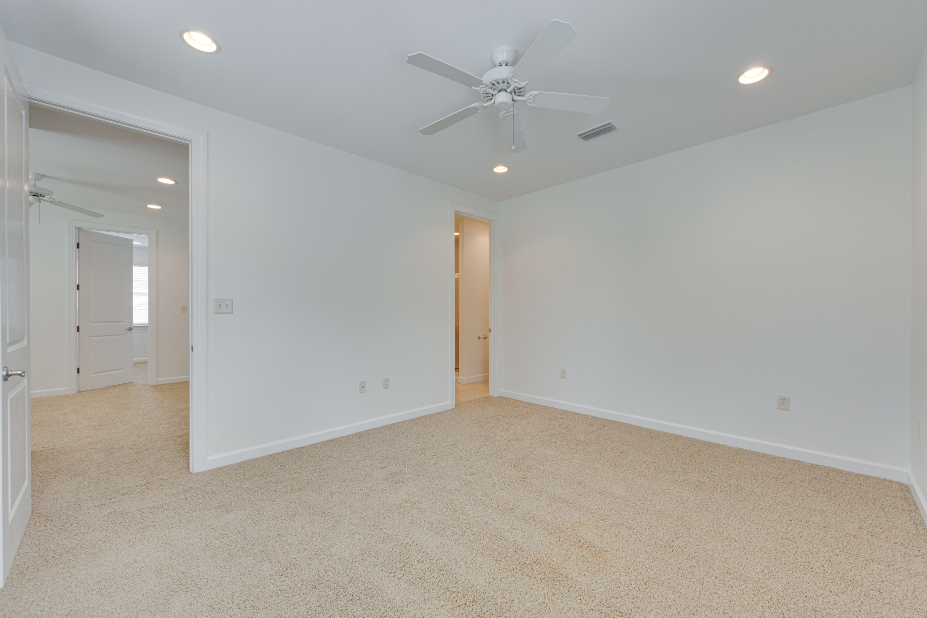 164 South Zander Way Santa Rosa Beach, FL 32459 - Photo 40 of 51 an empty room with a ceiling fan and a bathroom