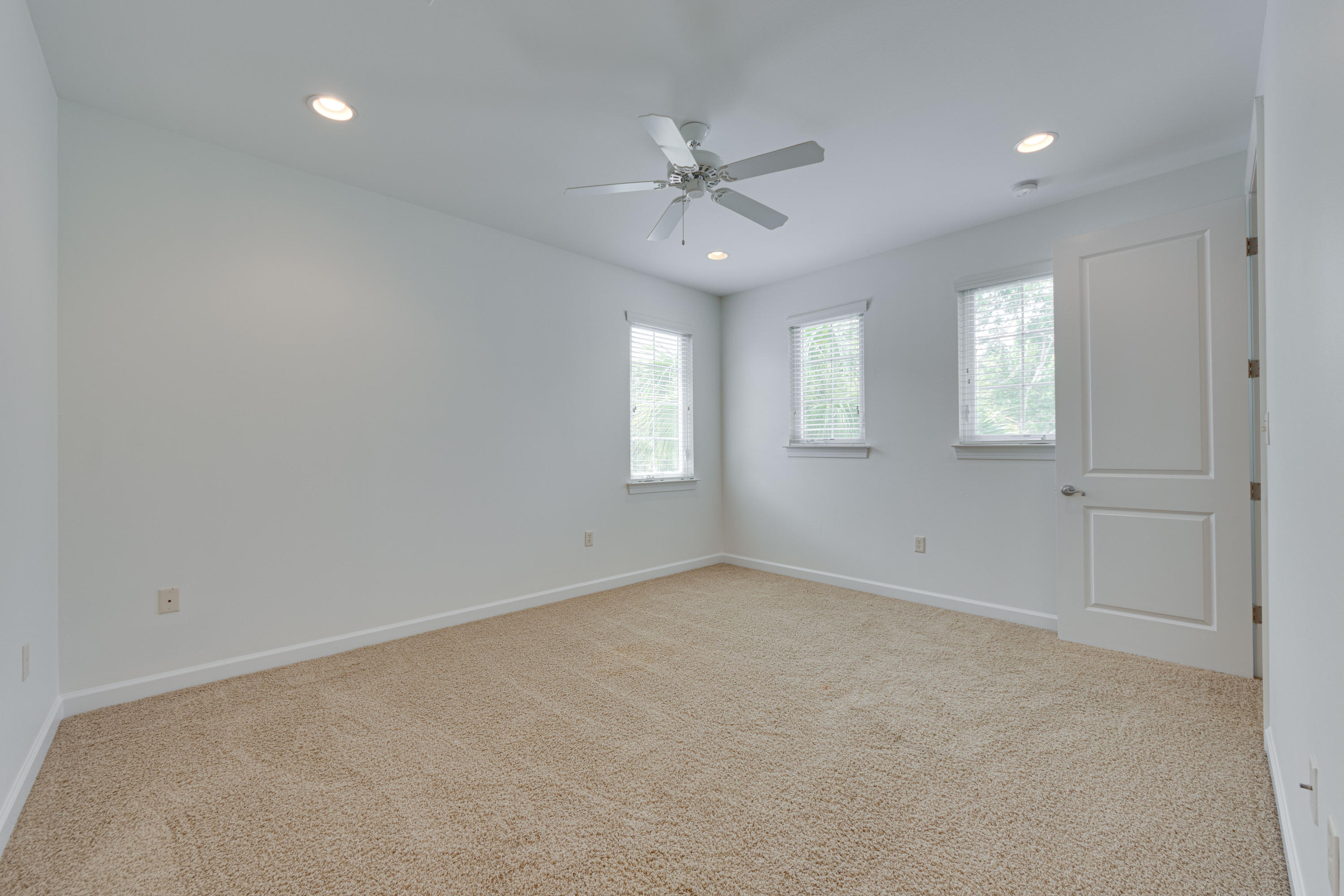 164 South Zander Way Santa Rosa Beach, FL 32459 - Photo 42 of 51 an empty room with windows and fan