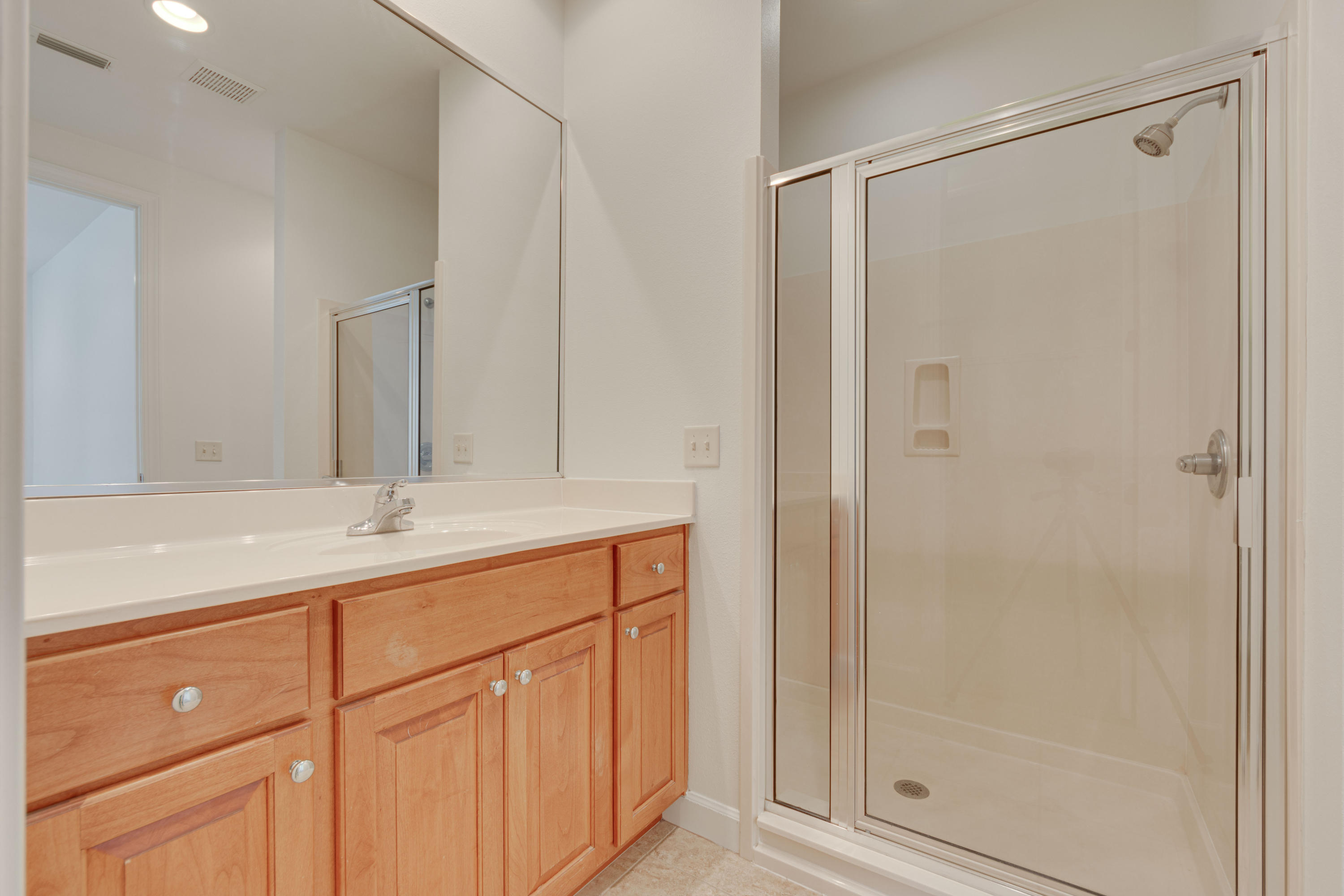 164 South Zander Way Santa Rosa Beach, FL 32459 - Photo 45 of 51 a bathroom with a shower sink and mirror