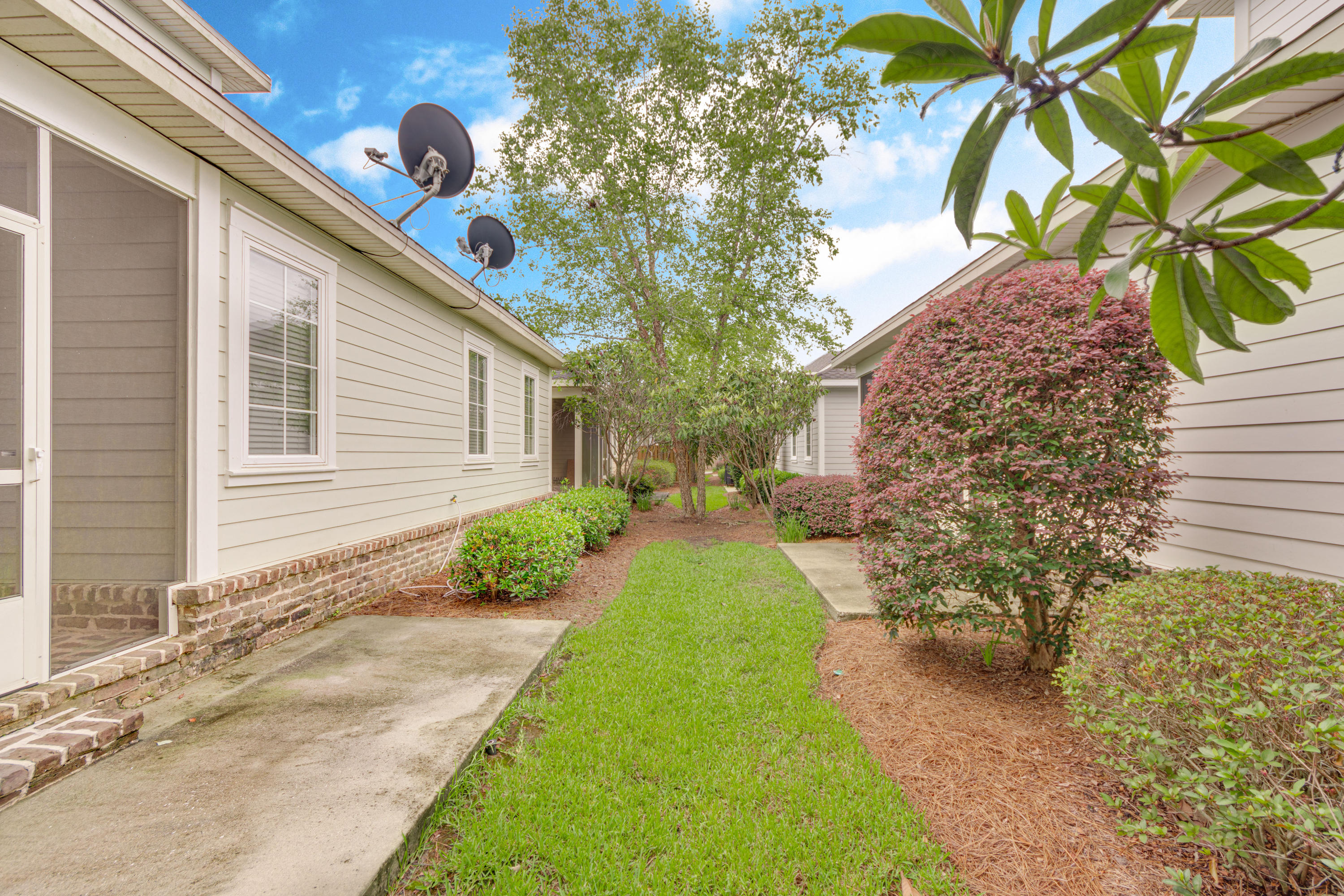 164 South Zander Way Santa Rosa Beach, FL 32459 - Photo 50 of 51 a front view of a house with garden