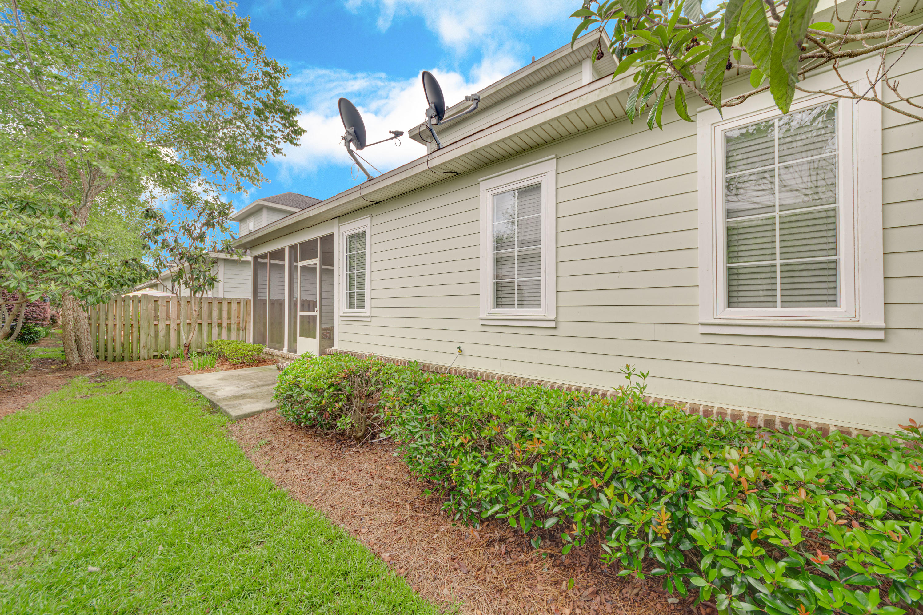 164 South Zander Way Santa Rosa Beach, FL 32459 - Photo 51 of 51 a front view of a house with garden