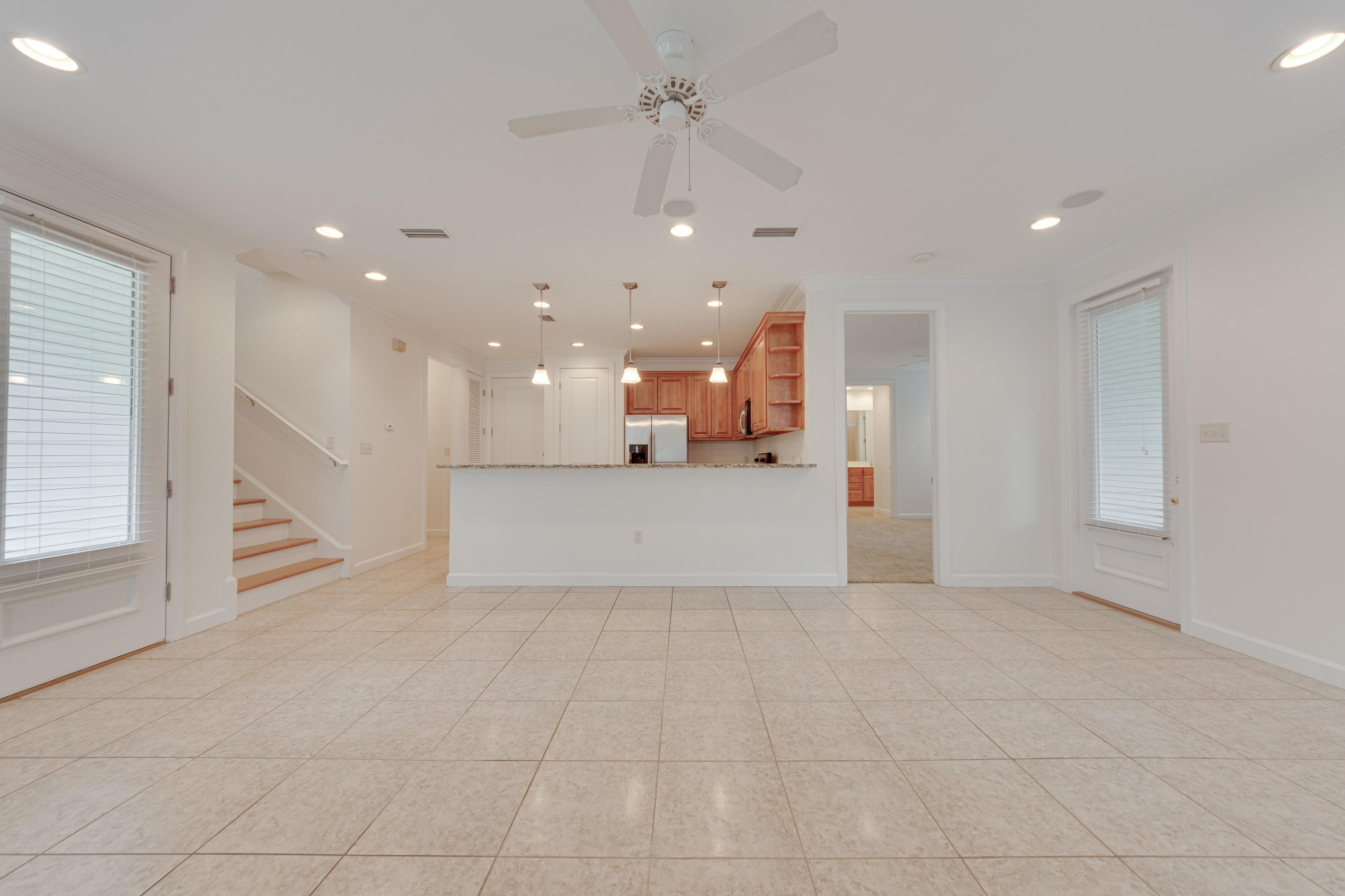 164 South Zander Way Santa Rosa Beach, FL 32459 - Photo 9 of 51 a view of a big room with wooden cabinet and a kitchen