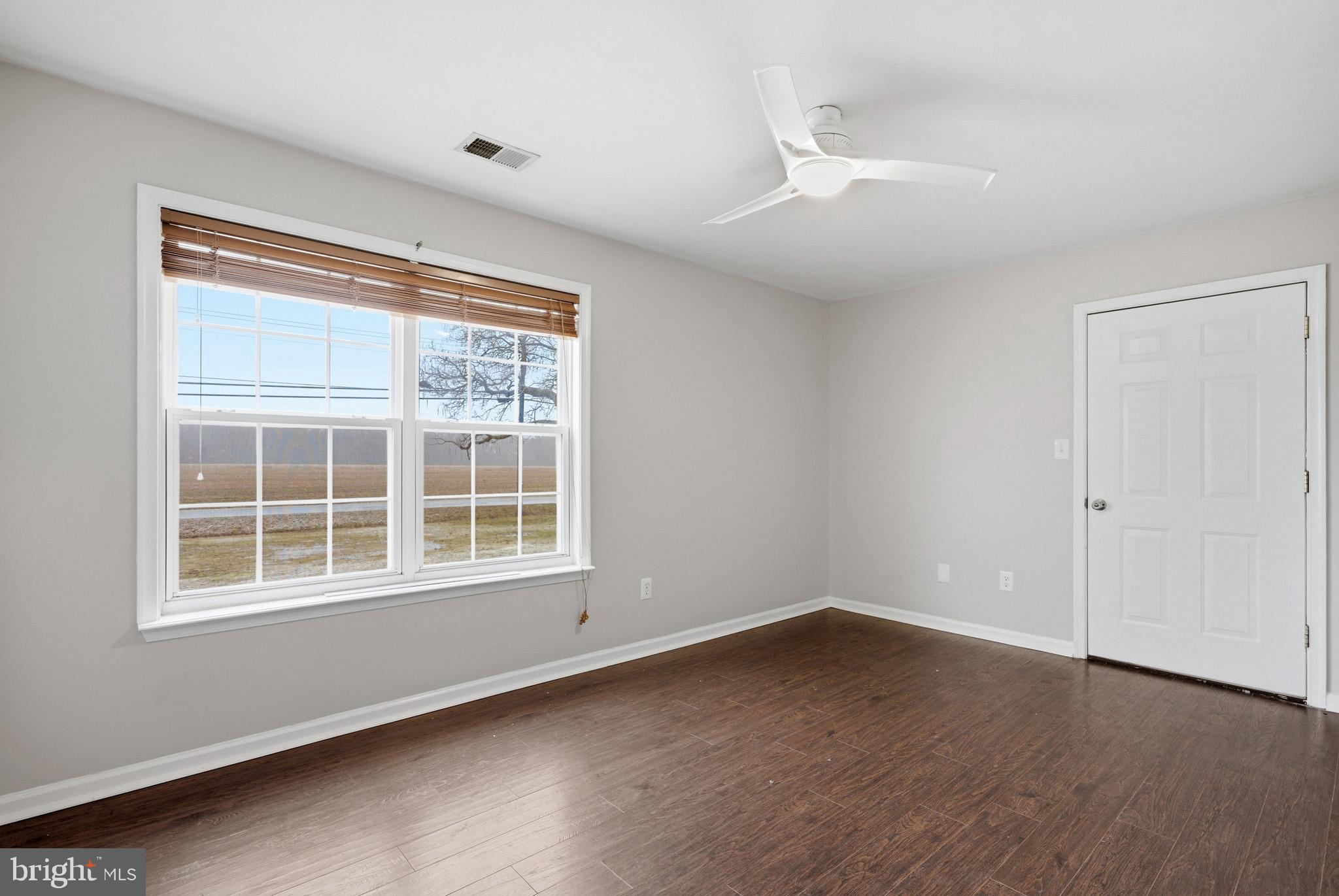 22343 Newtowne Neck Road Leonardtown, MD 20650 - Photo 30 of 40 Enjoy the view from the large windows.