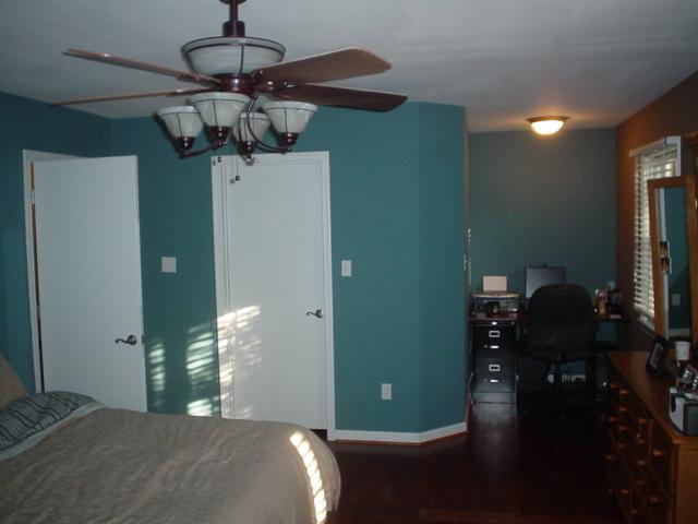 2962 Tree Swallow Road Roanoke, VA 24018 - Photo 12 of 21 a bedroom with a bed and chandelier