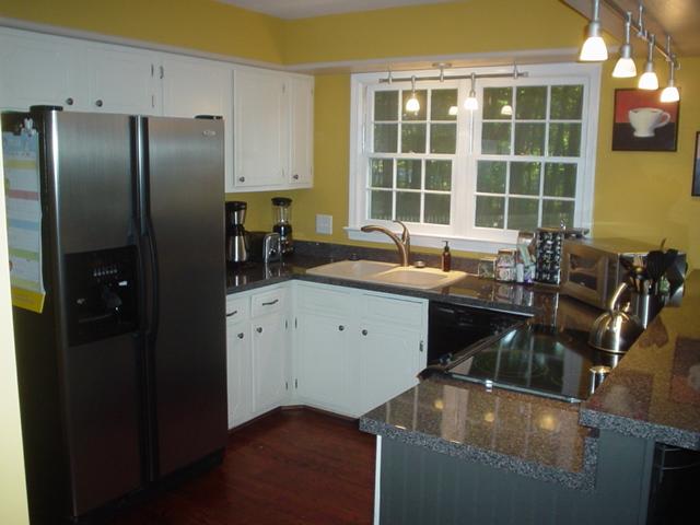 2962 Tree Swallow Road Roanoke, VA 24018 - Photo 4 of 21 a kitchen with a refrigerator and a sink