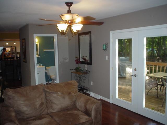 2962 Tree Swallow Road Roanoke, VA 24018 - Photo 8 of 21 a bedroom with a bed and a chandelier
