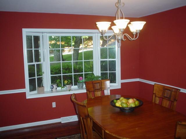 2962 Tree Swallow Road Roanoke, VA 24018 - Photo 10 of 21 a view of a dining room with furniture a chandelier and wooden floor