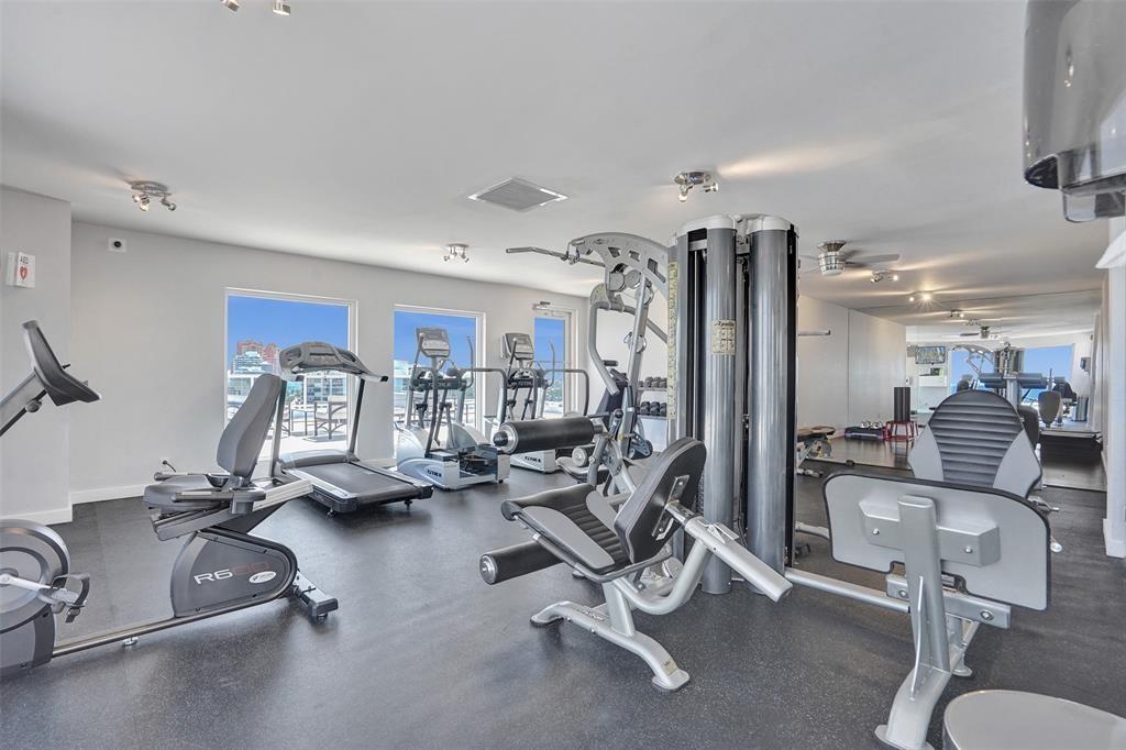 2841 North Ocean Boulevard, Unit 1508 Fort Lauderdale, FL 33308 - Photo 22 of 31 a view of a room with gym equipment