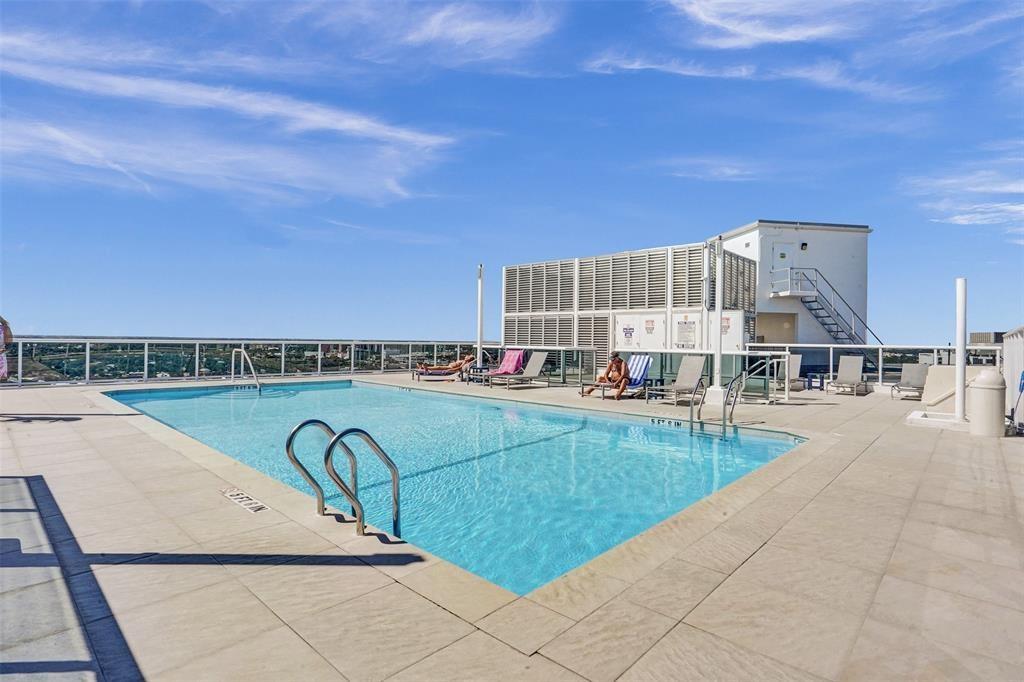 2841 North Ocean Boulevard, Unit 1508 Fort Lauderdale, FL 33308 - Photo 23 of 31 a view of a swimming pool and outdoor seating