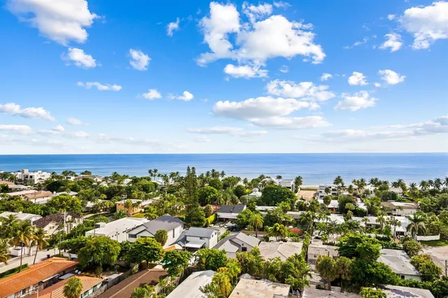 a living room with furniture and flat screen tv
