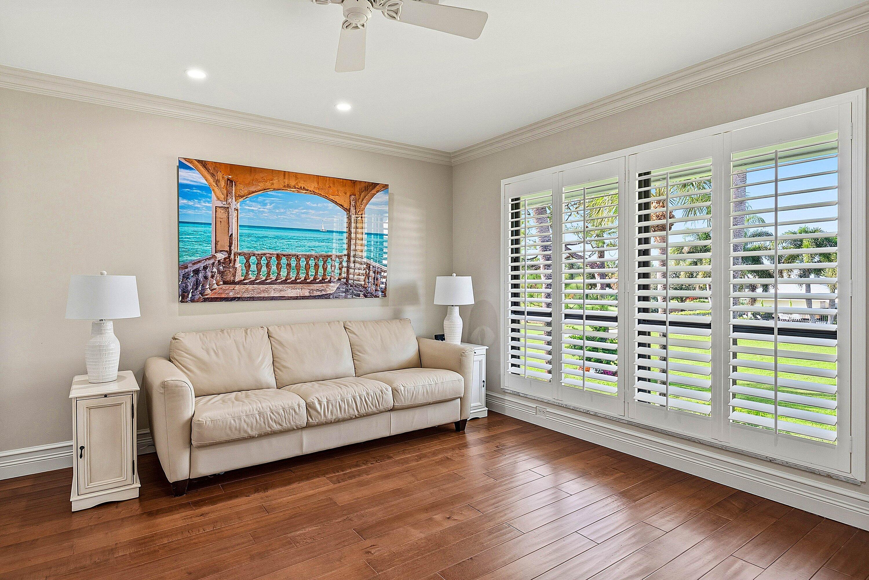3675 Quail Ridge Drive, Unit BOBWHITE B Boynton Beach, FL 33436 - Photo 11 of 48 a living room with furniture and a large window