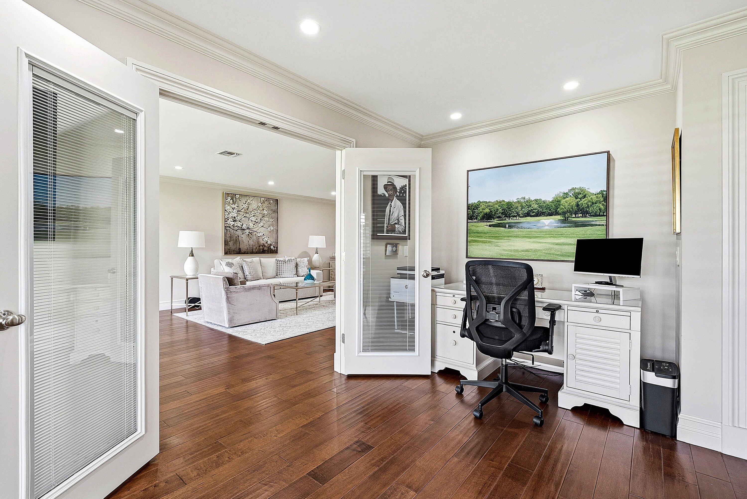 3675 Quail Ridge Drive, Unit BOBWHITE B Boynton Beach, FL 33436 - Photo 13 of 48 a view of a livingroom with workspace and a window