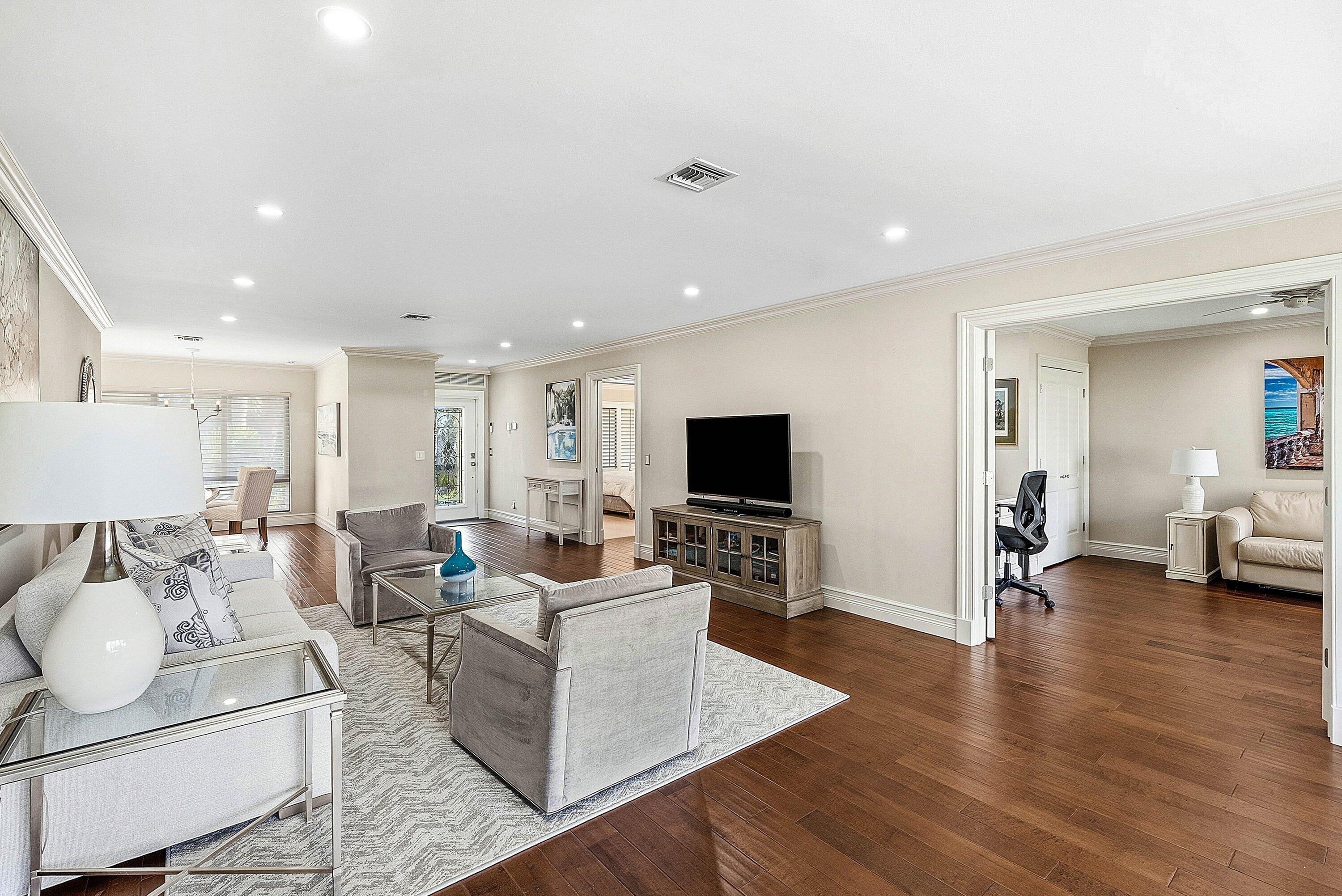 3675 Quail Ridge Drive, Unit BOBWHITE B Boynton Beach, FL 33436 - Photo 15 of 48 a living room with furniture and a flat screen tv