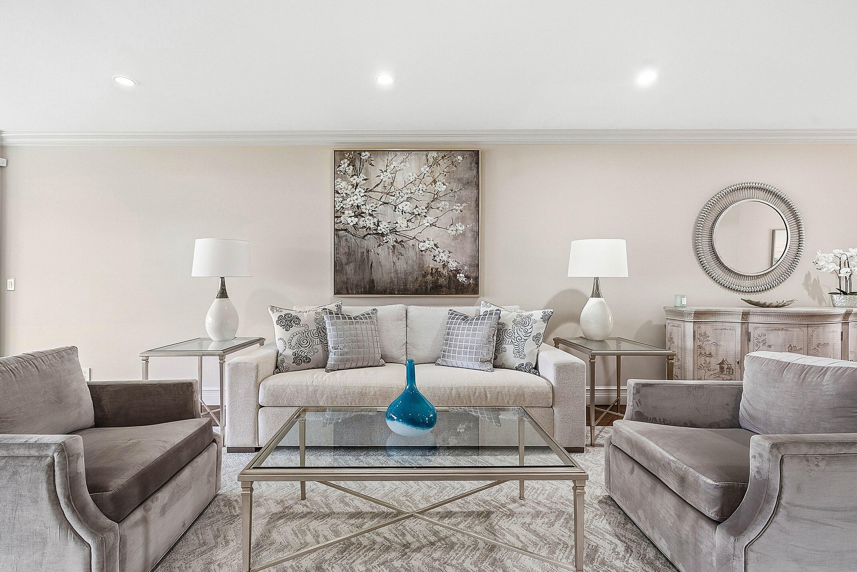 3675 Quail Ridge Drive, Unit BOBWHITE B Boynton Beach, FL 33436 - Photo 6 of 48 a living room with furniture a rug and a lamp