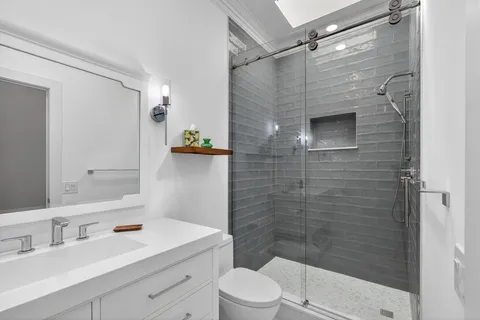 a front view of house and yard with swimming pool and furniture