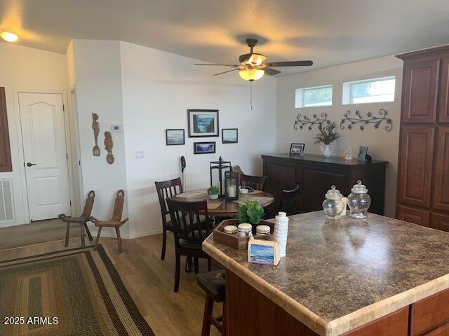 2528 East McKellips Road, Unit 146 Mesa, AZ 85213 - Photo 2 of 41 a view of a dining room with furniture and chandelier