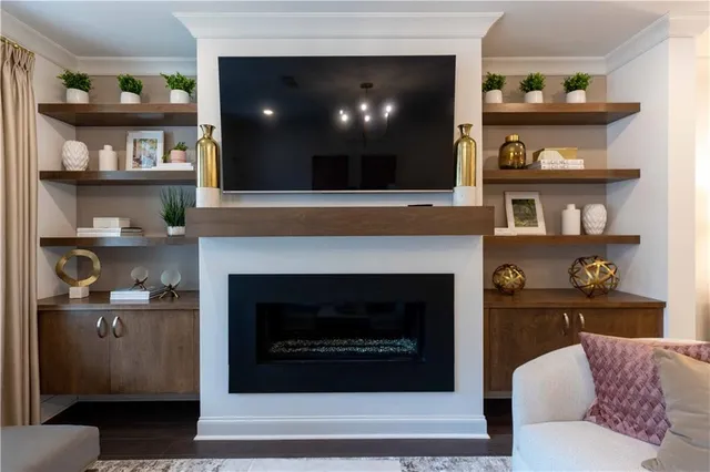 a living room with a couch and a fireplace