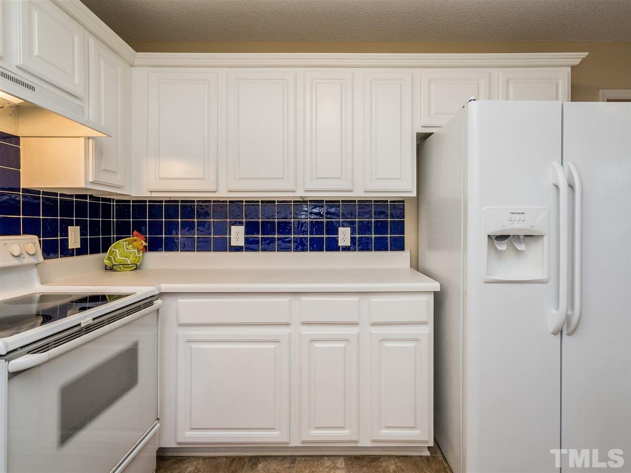 7273 Turner Fish Road Willow Spring, NC 27592 - Photo 15 of 25 The laundry room is conveniently located off the kitchen.