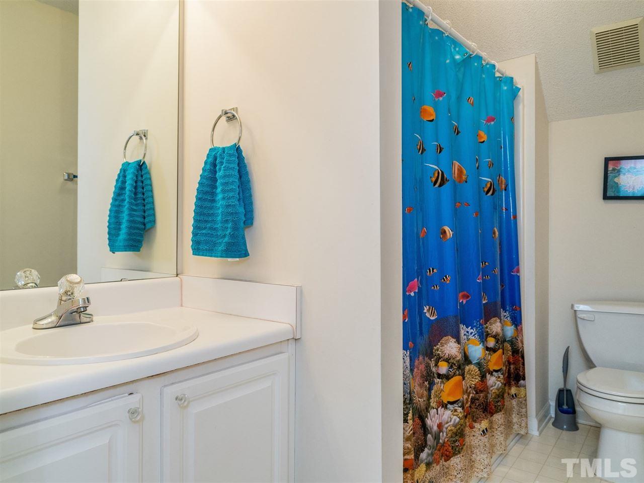 7273 Turner Fish Road Willow Spring, NC 27592 - Photo 20 of 25 This full bath is located on the second floor and has a tub/shower combination.
