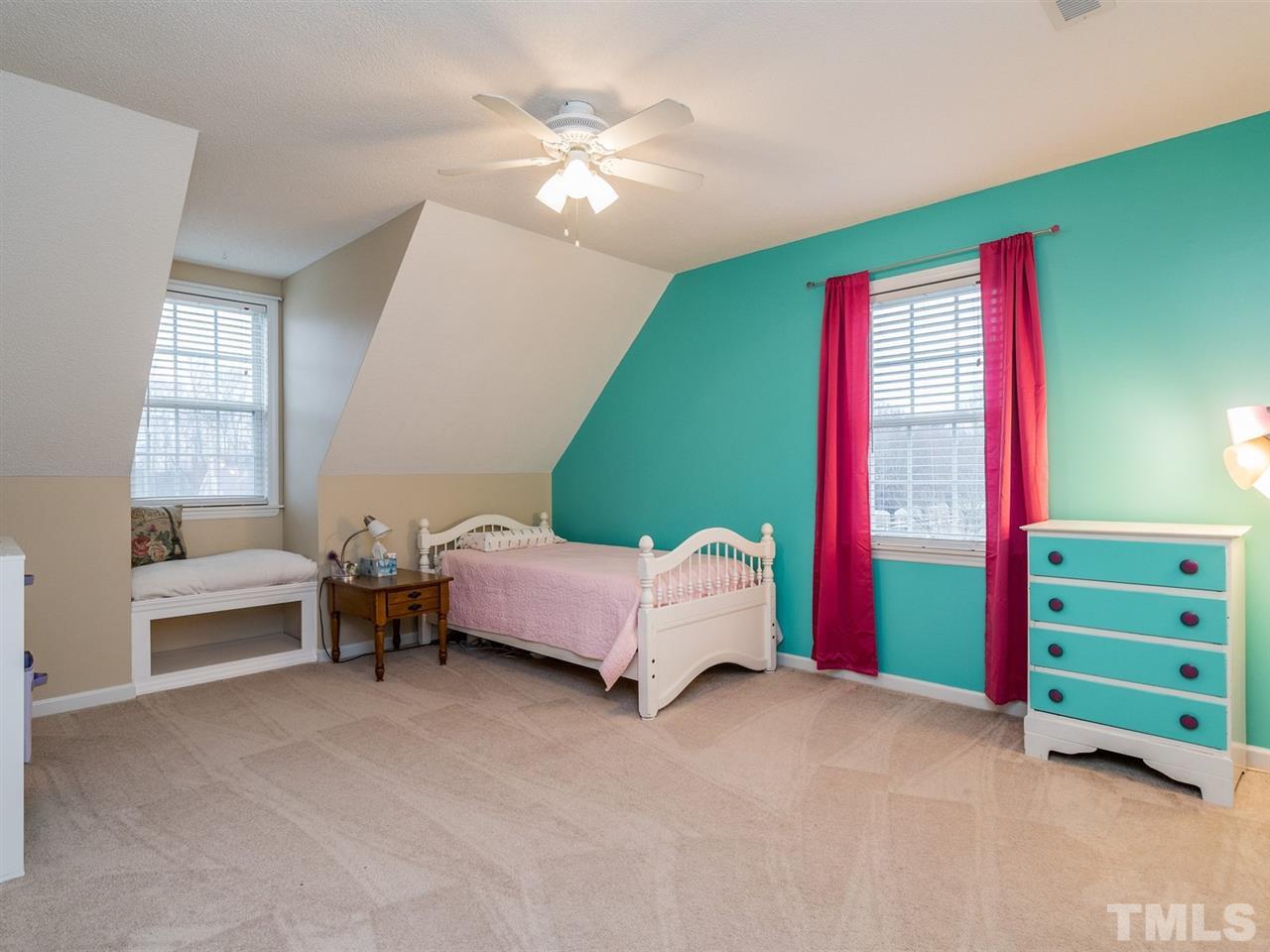 7273 Turner Fish Road Willow Spring, NC 27592 - Photo 21 of 25 Both secondary bedrooms have very spacious closets.