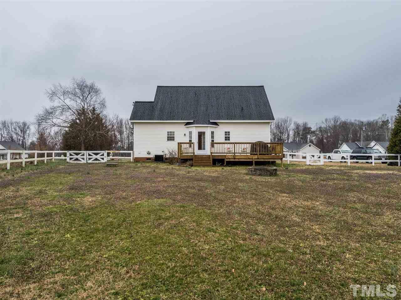 7273 Turner Fish Road Willow Spring, NC 27592 - Photo 24 of 25 This home is nestled on a .78 acre lot and has a fenced back yard. There's plenty of room to run and play.