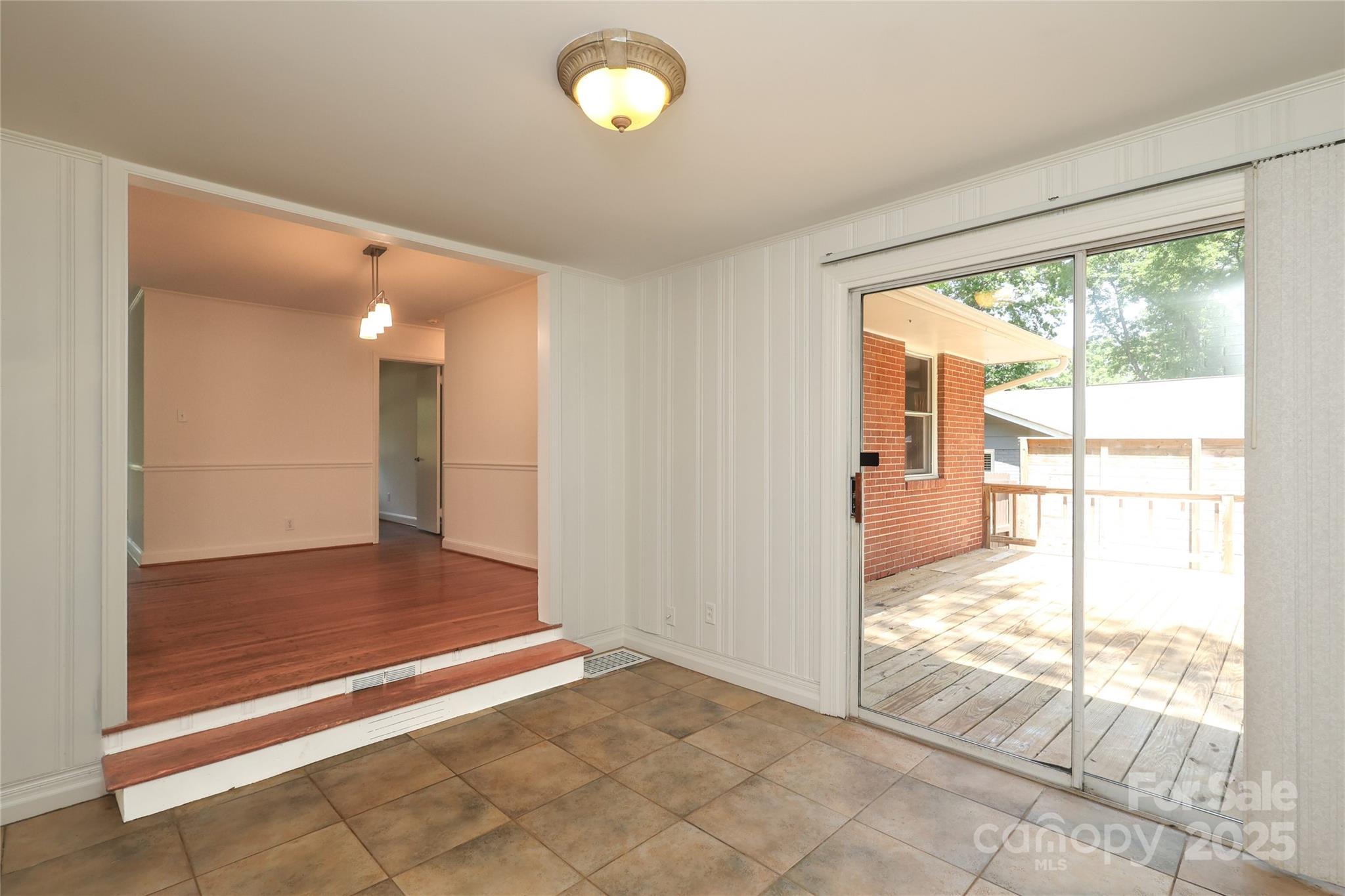 4361 Applegate Road Charlotte, NC 28209 - Photo 9 of 17 a view of an empty room and window