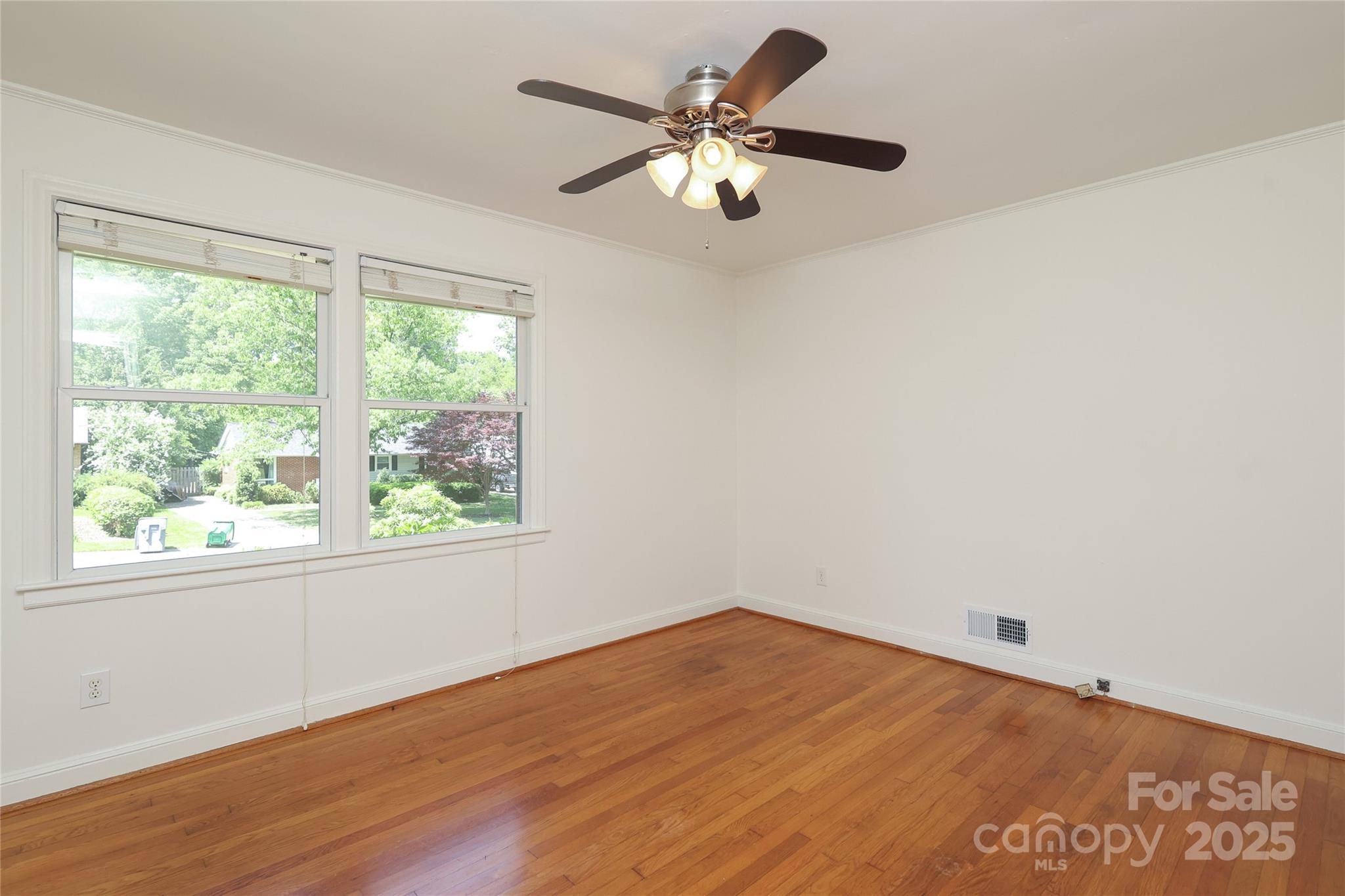 4361 Applegate Road Charlotte, NC 28209 - Photo 10 of 17 wooden floor in an empty room with a window