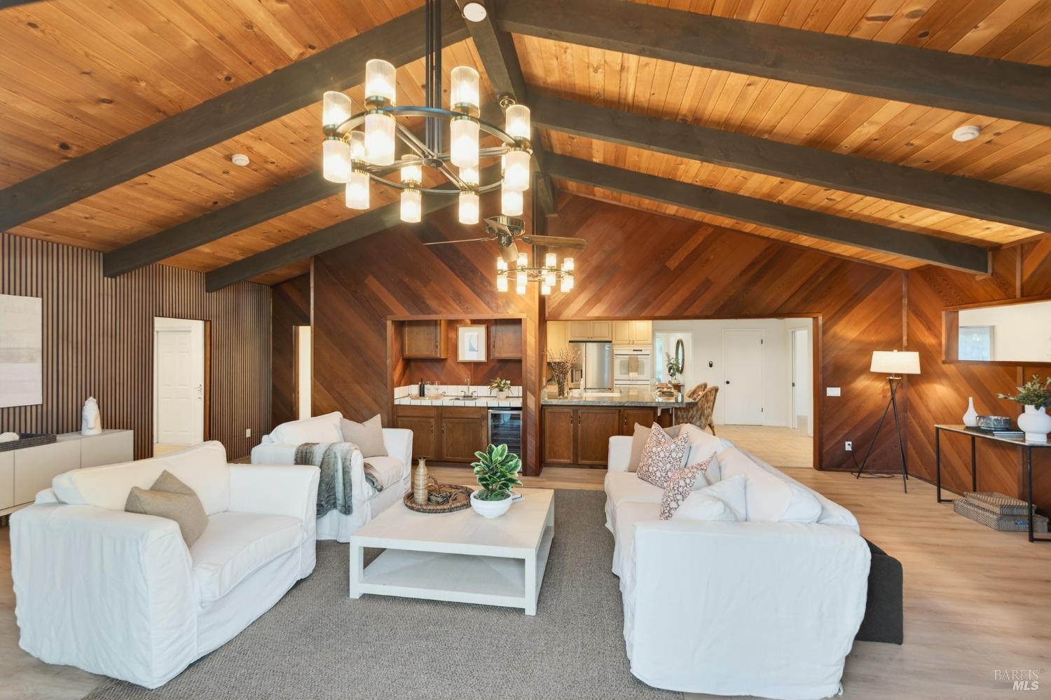 2447 Rigdon Street Napa, CA 94558 - Photo 23 of 79 a living room with furniture and a chandelier