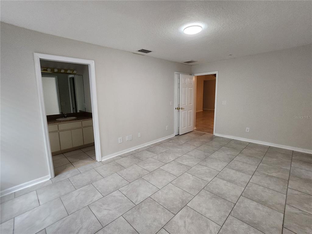 6521 East Grayson Street Inverness, FL 34452 - Photo 9 of 16 a view of an empty room and window