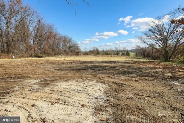 a white bath tub sitting next to a white sink