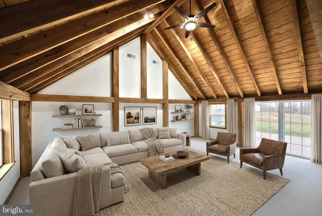 a view of a house with snow in front of house