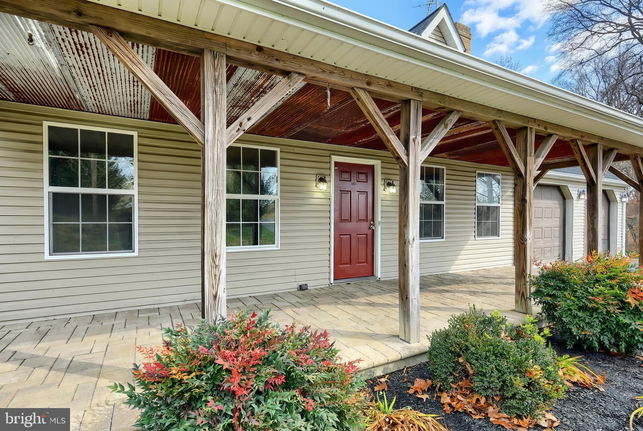 5077 Snyder Mill Road Spring Grove, PA 17362 - Photo 10 of 71 a front view of a house with a yard