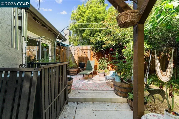 a view of a porch with furniture