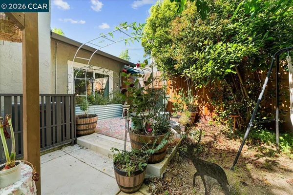a garden view with a seating space