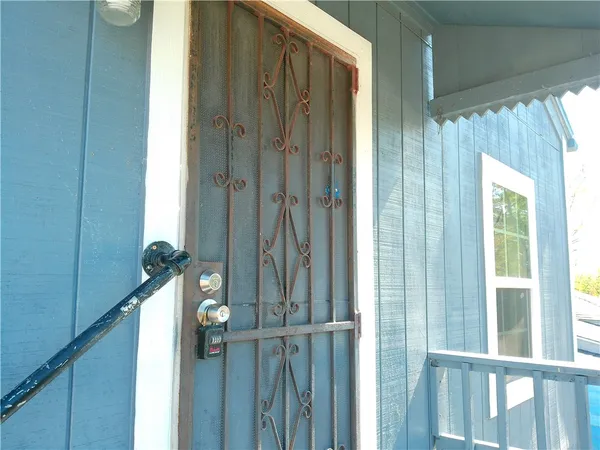a bathroom with a shower and a sink