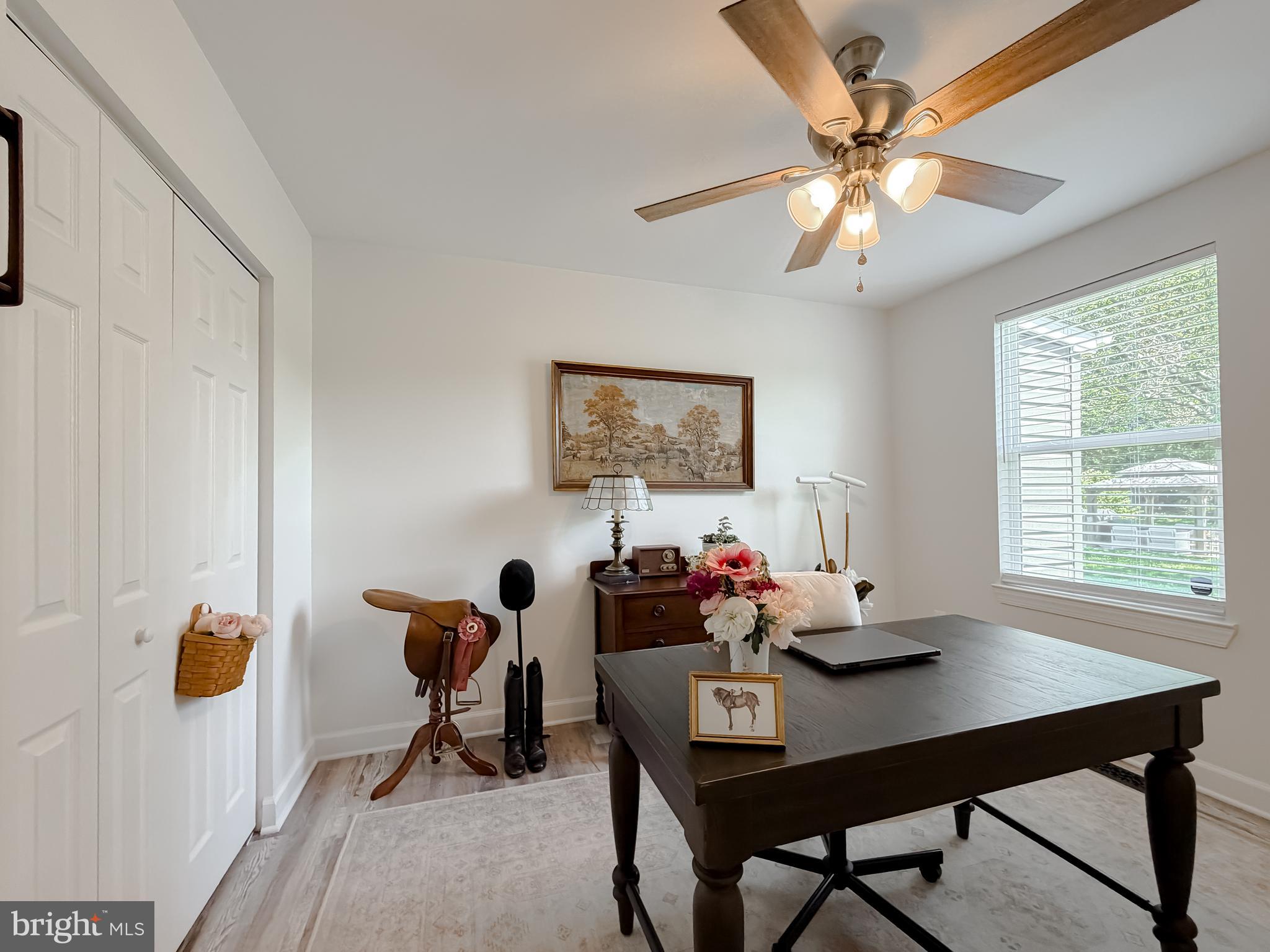 4985 Solomons Island Road Huntingtown, MD 20639 - Photo 24 of 50 a view of a workspace with furniture and a window