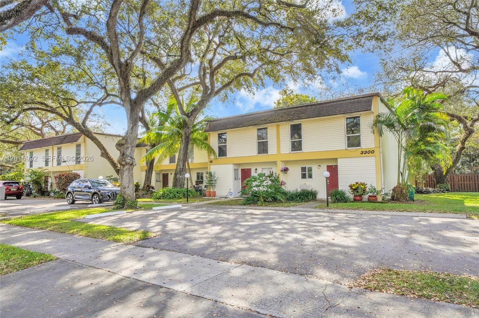 3300 Atlanta Street, Unit 15F Hollywood, FL 33021 - Photo 1 of 30 a view of a house with a yard