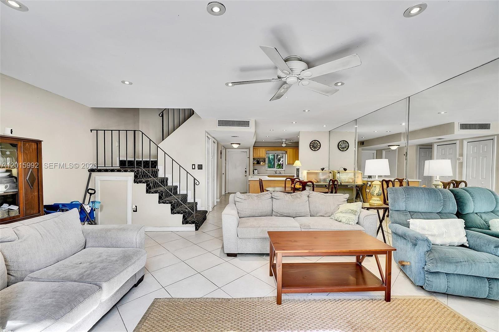 3300 Atlanta Street, Unit 15F Hollywood, FL 33021 - Photo 18 of 30 a living room with furniture and wooden floor