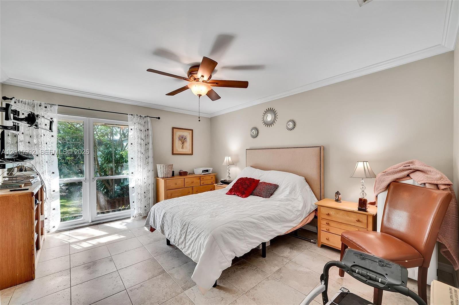 3300 Atlanta Street, Unit 15F Hollywood, FL 33021 - Photo 20 of 30 a bedroom with a bed and window