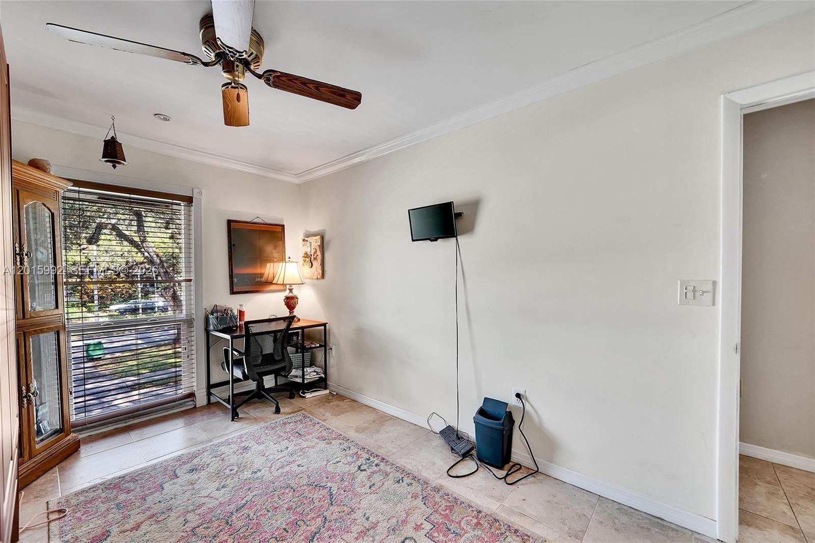 3300 Atlanta Street, Unit 15F Hollywood, FL 33021 - Photo 27 of 30 a view of a workspace with furniture and a window