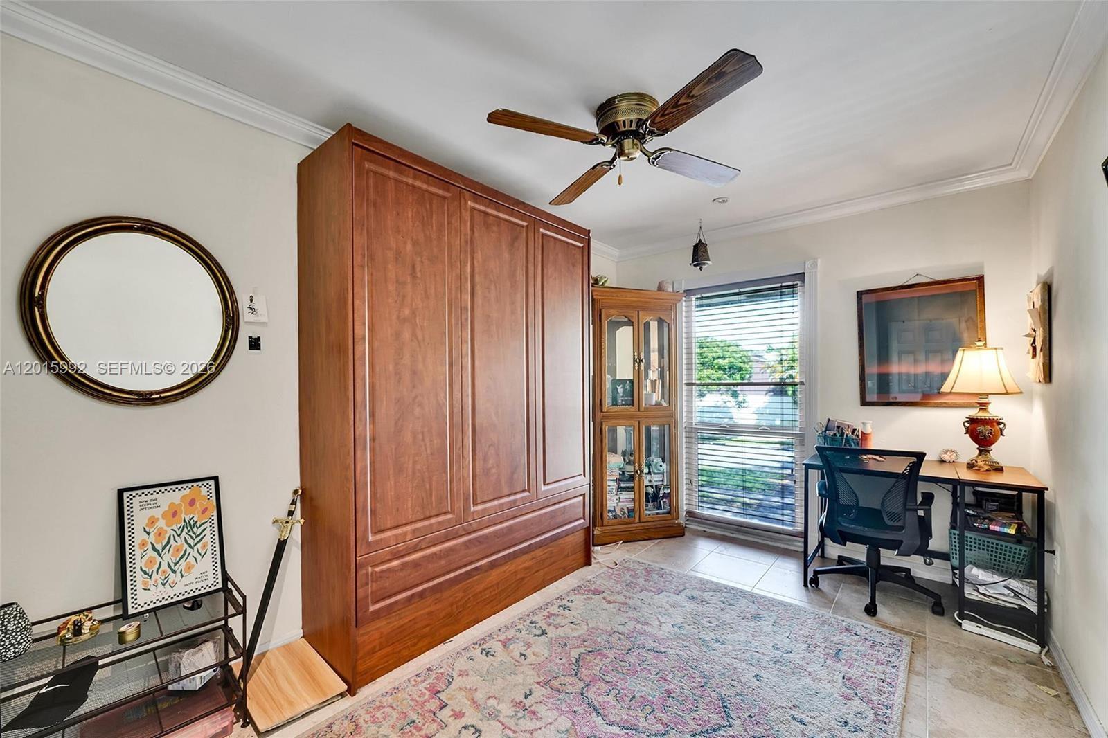 3300 Atlanta Street, Unit 15F Hollywood, FL 33021 - Photo 28 of 30 a view of a livingroom with furniture and a window