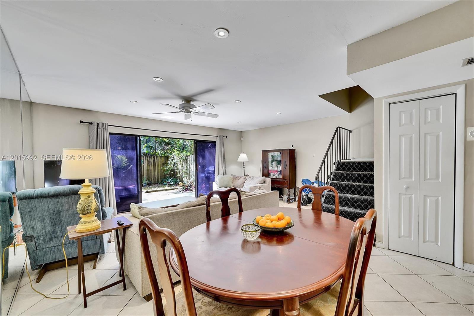 3300 Atlanta Street, Unit 15F Hollywood, FL 33021 - Photo 9 of 30 a view of a dining room with furniture window and outside view